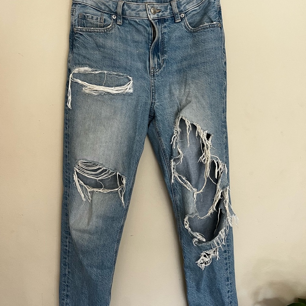 Distressed Blue Denim Jeans